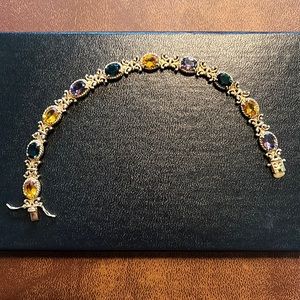 Sterling silver gold plated multi color gemstone bracelet. Mardi Gras colors!